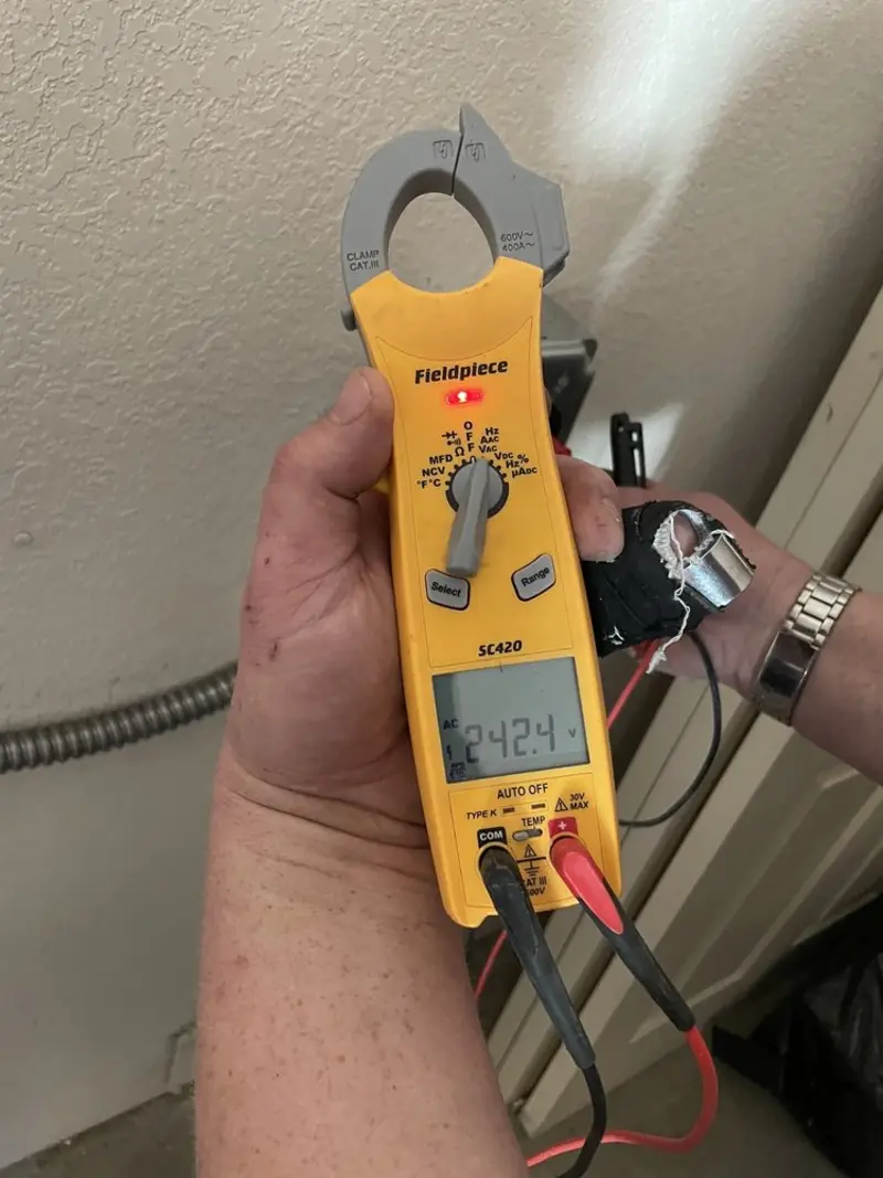 Voltage testing with clamp meter during Aluminum Wiring Replacement in Berwick
